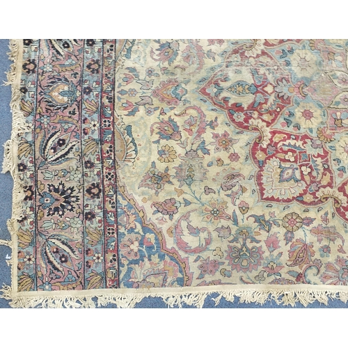 2198 - Rectangular cream ground rug having an all over floral design, 300cm x 165cm