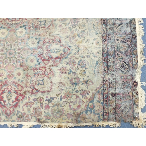 2198 - Rectangular cream ground rug having an all over floral design, 300cm x 165cm