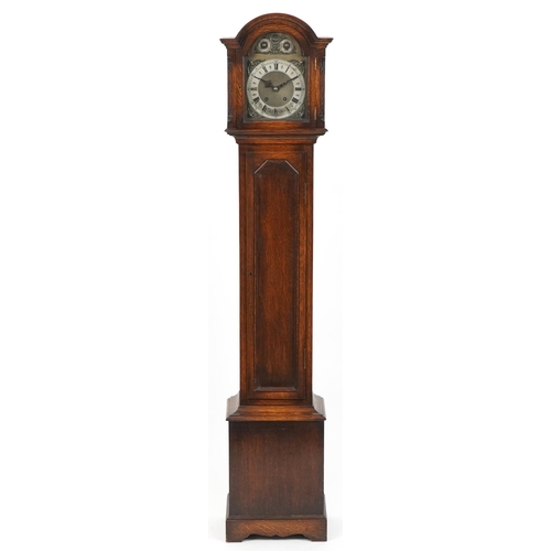 2148 - Oak cased grandmother clock with blind fret panels and silvered chapter rings having Roman and Arabi... 