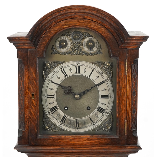 2148 - Oak cased grandmother clock with blind fret panels and silvered chapter rings having Roman and Arabi... 