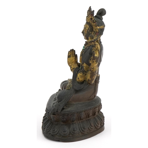 70 - 18th Century Chino Tibetan gilt bronze buddha of Sadaksari inset with turquoise cabochons, 16cm high... 