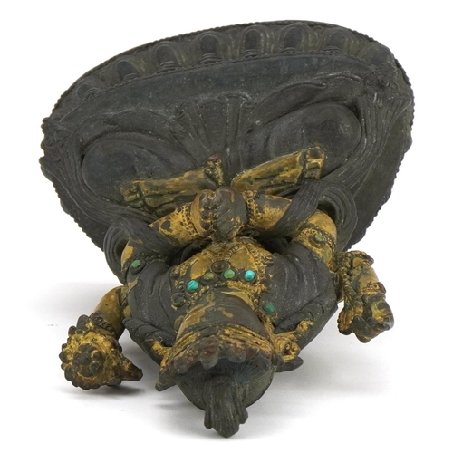 70 - 18th Century Chino Tibetan gilt bronze buddha of Sadaksari inset with turquoise cabochons, 16cm high... 