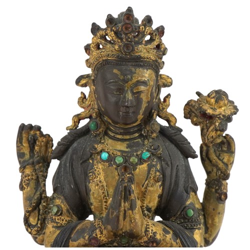 70 - 18th Century Chino Tibetan gilt bronze buddha of Sadaksari inset with turquoise cabochons, 16cm high... 