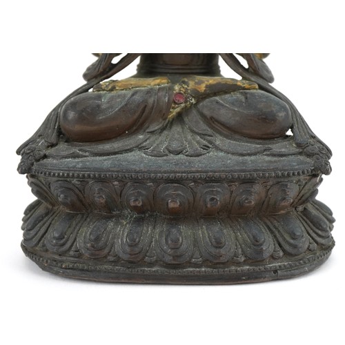 70 - 18th Century Chino Tibetan gilt bronze buddha of Sadaksari inset with turquoise cabochons, 16cm high... 