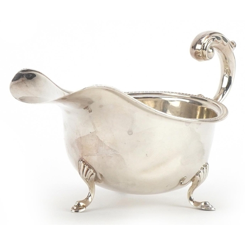 400 - S Blanckensee & Son Ltd, George V silver three footed sauceboat, Birmingham 1934, 17cm in length, 15... 