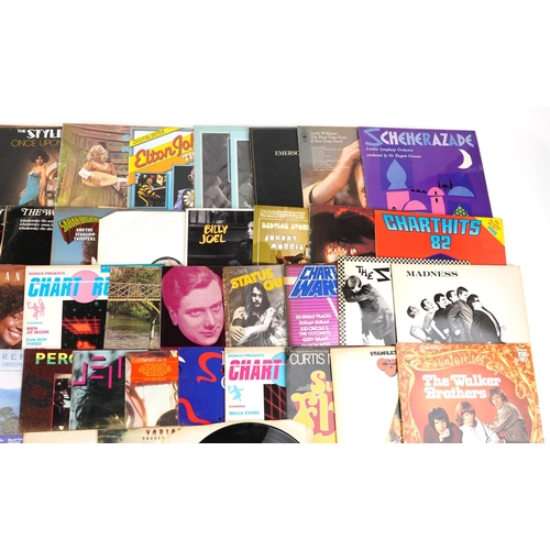 1035 - Vinyl LP records including Emerson, Lake & Palmer, Status Quo, Madness, Rod Stewart, Nazareth, The B... 