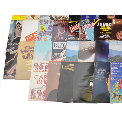 1035 - Vinyl LP records including Emerson, Lake & Palmer, Status Quo, Madness, Rod Stewart, Nazareth, The B... 