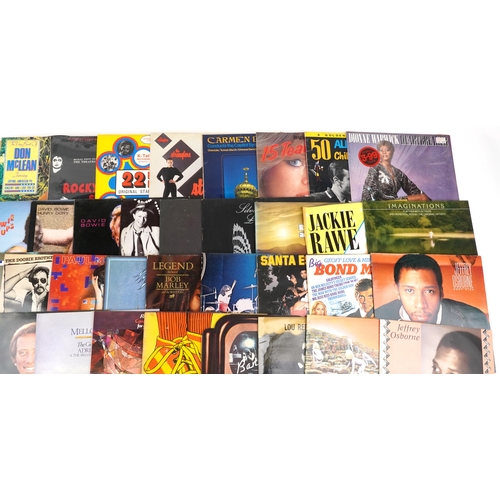 1036 - Vinyl LP records including The Eagles, Paul McCartney, The Doobie Brothers, David Bowie, Elton John,... 