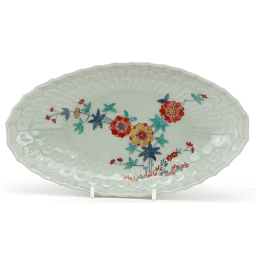 2644 - Japanese Kakiemon ovoid dish hand painted with flowers, 21.5cm wide