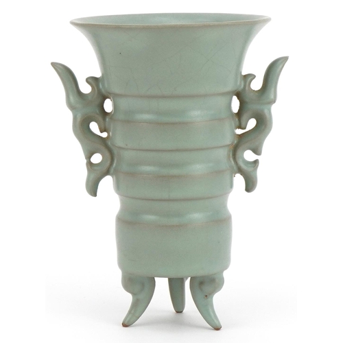 2528 - Chinese porcelain tripod vase with twin handles having a celadon glaze, 15.5cm high