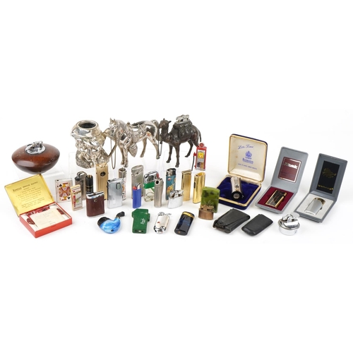 1307 - Vintage and later table and pocket lighters including an example in the form of a camel, Ronson Vara... 