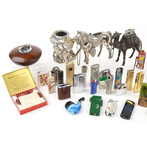 1307 - Vintage and later table and pocket lighters including an example in the form of a camel, Ronson Vara... 