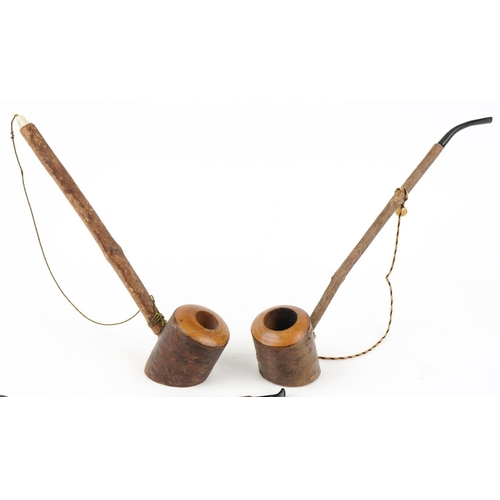 1317 - Eight large European briar tobacco smoking pipes, the largest 75cm in length