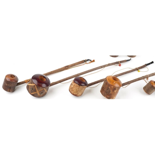 1317 - Eight large European briar tobacco smoking pipes, the largest 75cm in length