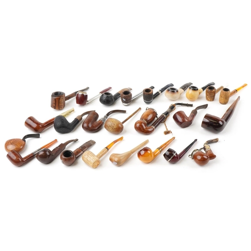 1283 - Twenty five vintage tobacco smoking pipes, one with silver mounts, some briar, including Wilson & Co... 