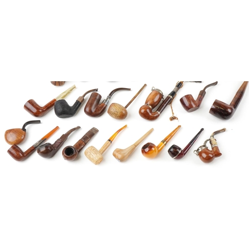 1283 - Twenty five vintage tobacco smoking pipes, one with silver mounts, some briar, including Wilson & Co... 