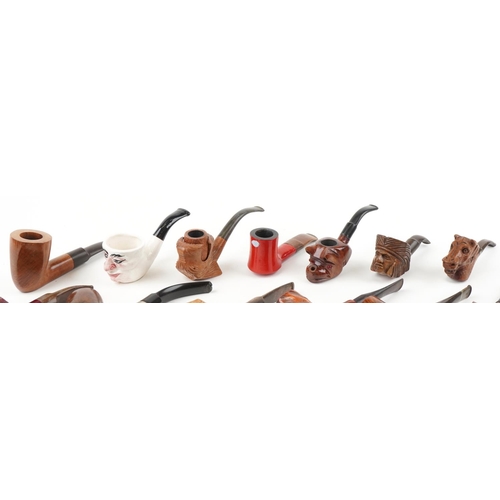 1284 - Twenty vintage tobacco smoking pipes, some briar examples, including figural and animal carved bowls... 