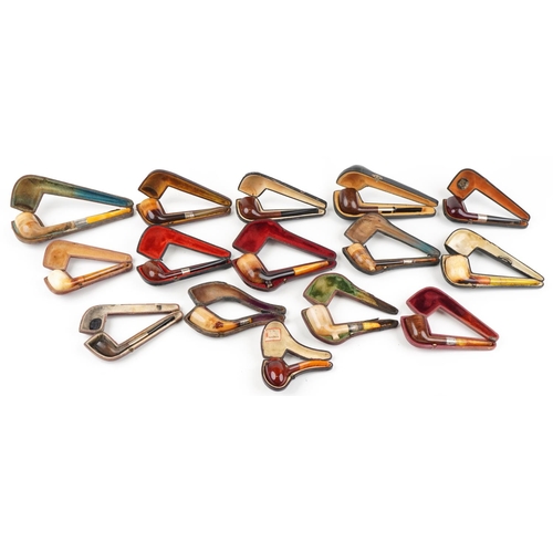 1286 - Fifteen Meerschaum tobacco smoking pipes with cases, some with amber colour mouthpieces and silver m... 