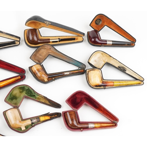 1286 - Fifteen Meerschaum tobacco smoking pipes with cases, some with amber colour mouthpieces and silver m... 