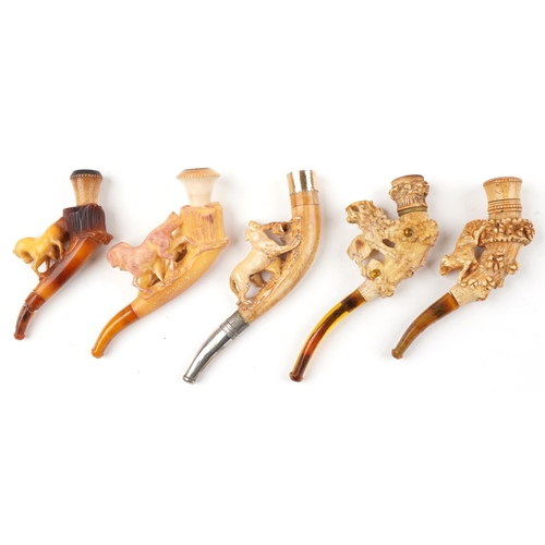 1253 - Five antique Meerschaum smoking pipes housed in fitted cases, each carved with animals, four with am... 