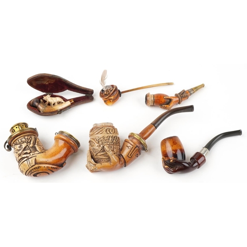 1252 - Six antique Meerschaum smoking pipes including three carved with hands, one carved with a wild anima... 