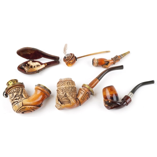 1252 - Six antique Meerschaum smoking pipes including three carved with hands, one carved with a wild anima... 