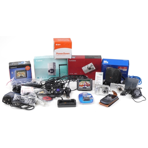 1064 - Electricals including Casio Exilim digital camera with box and Garmin Nuvi 250 sat nav