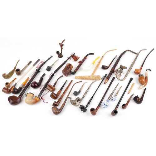 1316 - Collection of vintage and later tobacco smoking pipes, including block Meerschaum, briar and white m... 