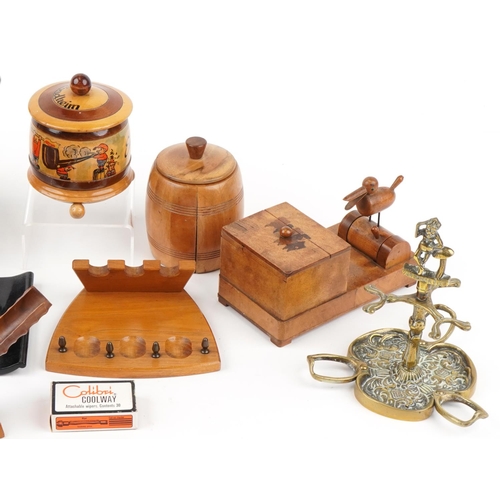 1330 - Smoking accessories comprising pipe racks, cigarette dispensers and tobacco boxes, the largest 29cm ... 