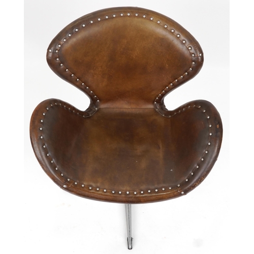 2118 - Timothy Oulton aviation interest Devon Spitfire swivel chair with brown leather upholstery, 90cm hig... 