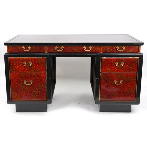 2140 - Chinese red and black lacquered twin pedestal desk with ornate brass handles fitted with an arrangem... 