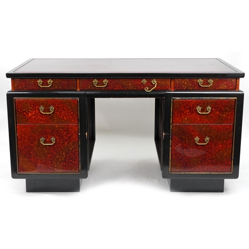 2140 - Chinese red and black lacquered twin pedestal desk with ornate brass handles fitted with an arrangem... 