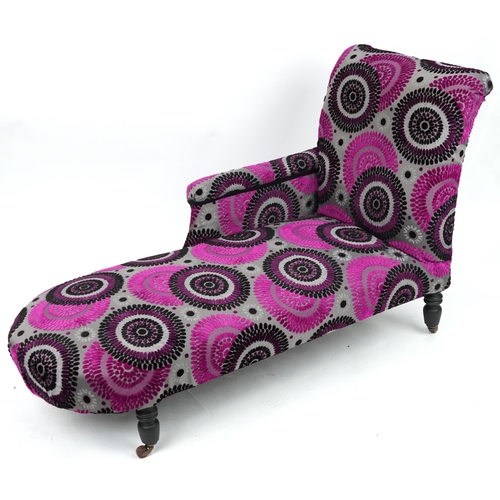 2059 - Chaise longue with contemporary pink, black and silver flower head design upholstery on turned eboni... 