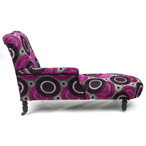 2059 - Chaise longue with contemporary pink, black and silver flower head design upholstery on turned eboni... 