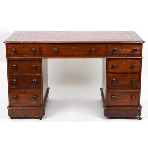 2045 - Victorian mahogany twin pedestal desk with tooled leather insert fitted with an arrangement of nine ... 