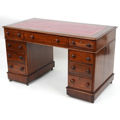 2045 - Victorian mahogany twin pedestal desk with tooled leather insert fitted with an arrangement of nine ... 