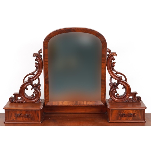 2032 - Ornate Victorian mahogany dressing chest with swing mirror fitted with an arrangement of ten drawers... 