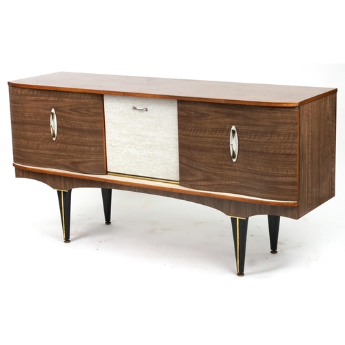 2144 - 1960s Formica sideboard fitted with three doors, on tapering ebonised legs, 78cm H x 150.5cm W x 44.... 