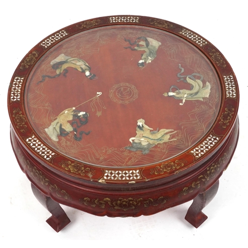 2039 - Chinese red lacquered chinoiserie centre table with inset glass top, mother of pearl and hardstone i... 