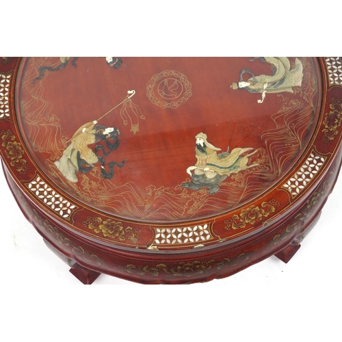 2039 - Chinese red lacquered chinoiserie centre table with inset glass top, mother of pearl and hardstone i... 