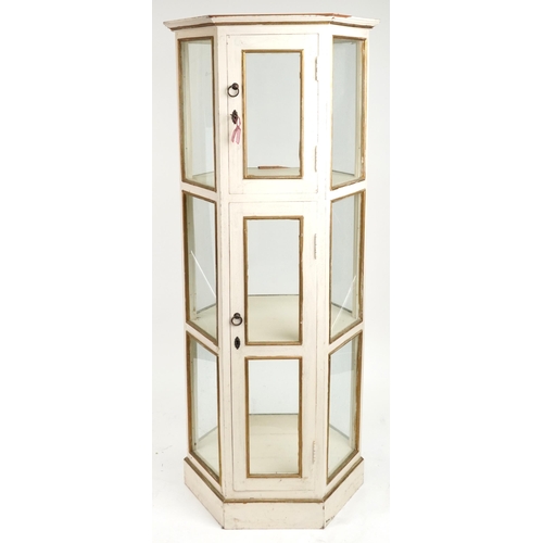 2058 - French style cream and gilt painted three tier hexagonal display cabinet with brass mounts, 180.5cm ... 