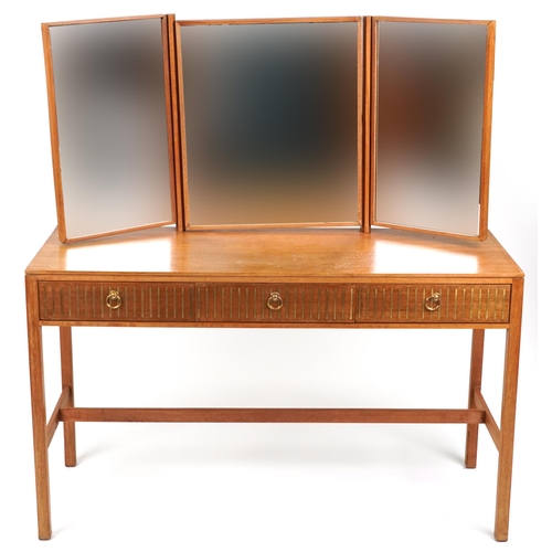 2066 - Loughborough, mid century teak three drawer dressing table with triple aspect folding mirror and bra... 