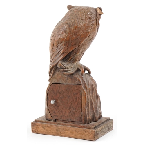 180 - German carved Black Forest hardwood clock case surmounted with an owl, 31cm high