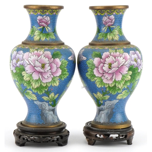 529 - Pair of Chinese Jingfa cloisonne baluster vases raised on hardwood stands enamelled with flowers, ea... 