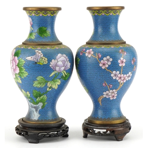 529 - Pair of Chinese Jingfa cloisonne baluster vases raised on hardwood stands enamelled with flowers, ea... 