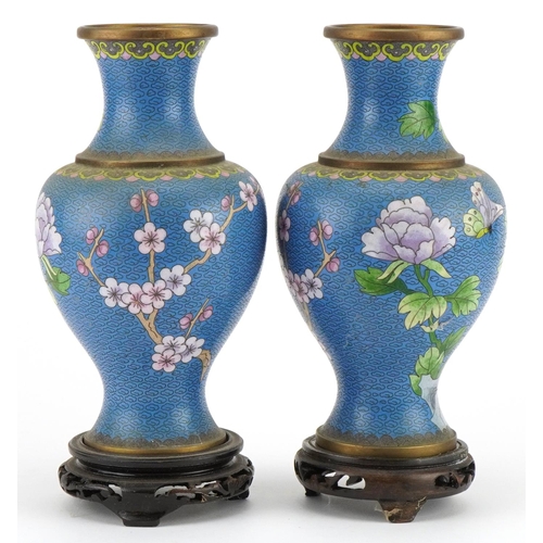 529 - Pair of Chinese Jingfa cloisonne baluster vases raised on hardwood stands enamelled with flowers, ea... 