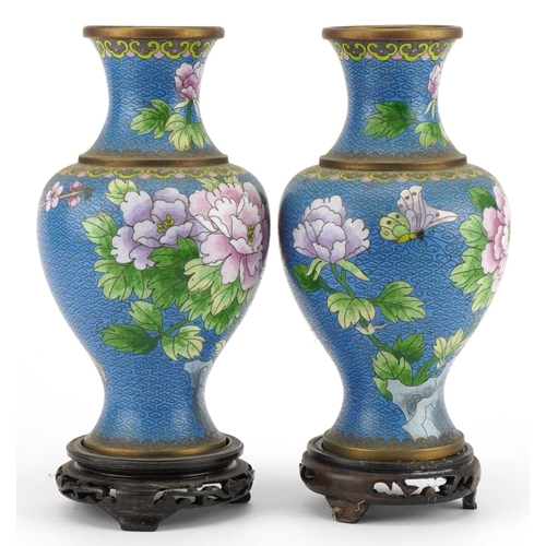 529 - Pair of Chinese Jingfa cloisonne baluster vases raised on hardwood stands enamelled with flowers, ea... 