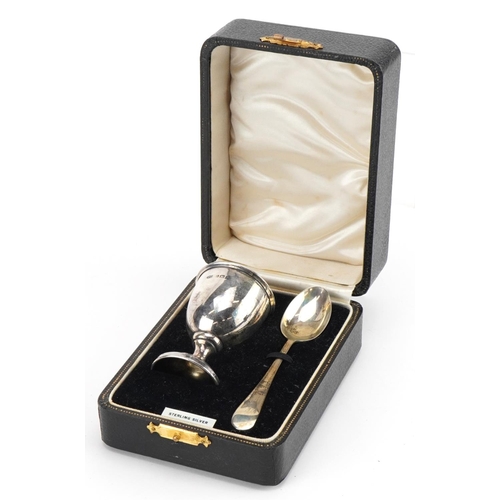 2409 - Arthur Price & Co Ltd, George VI silver christening egg cup and spoon housed in a velvet and silk li... 