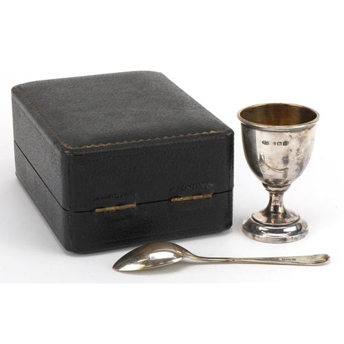 2409 - Arthur Price & Co Ltd, George VI silver christening egg cup and spoon housed in a velvet and silk li... 