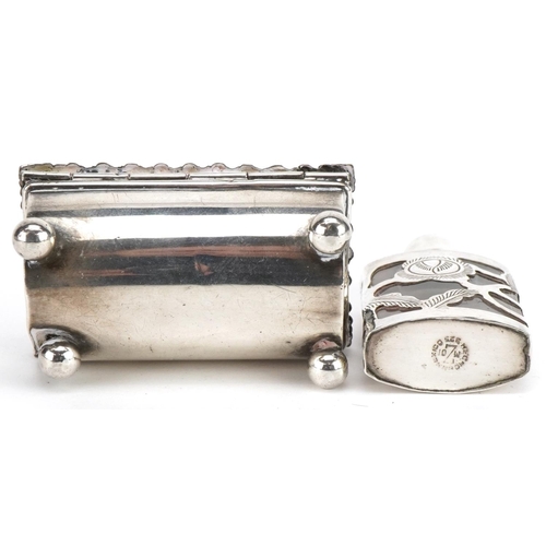 628 - Silver objects comprising a double stamp box with ball feet, letter opener and silver overlaid glass... 